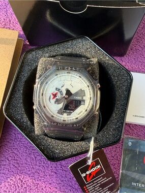 Casio G-Shock Translucent Smoke Watch with White Dial and Black Accents